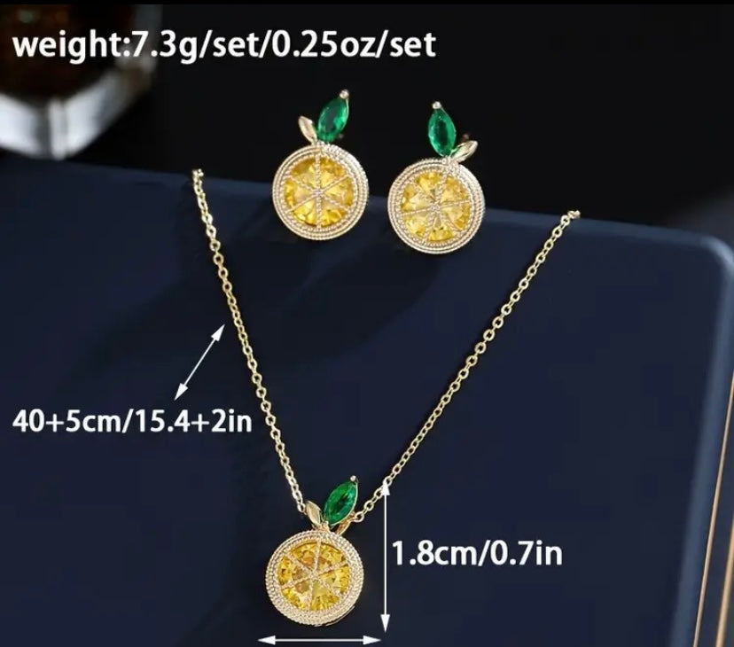Lemon drop gold colored earrings and necklace