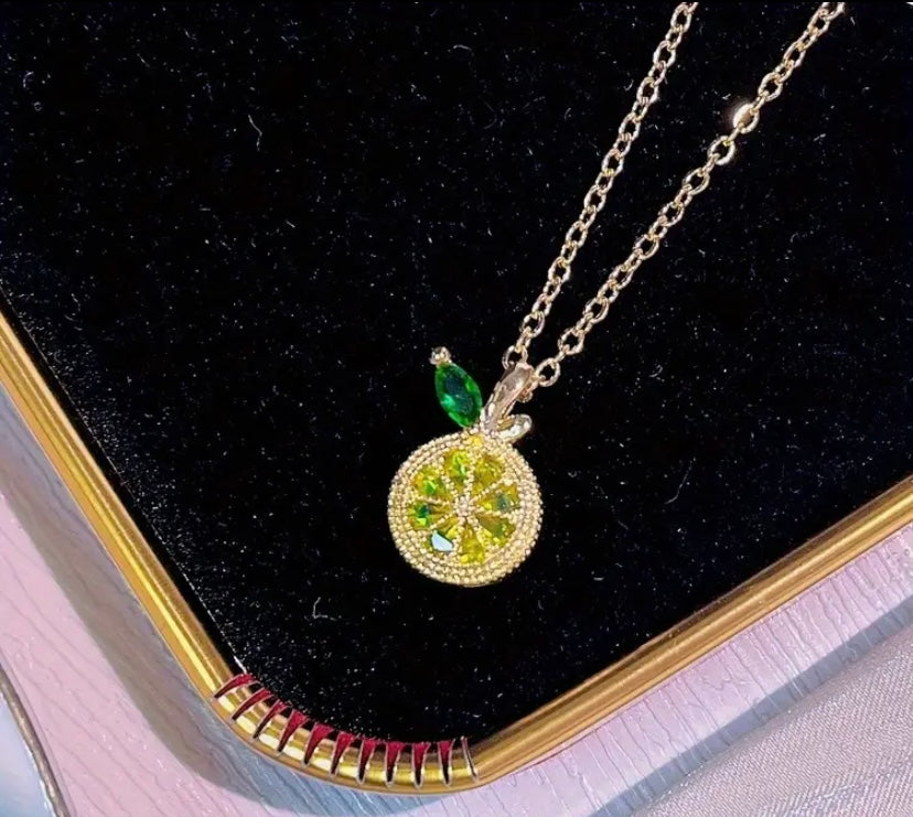 Lemon drop gold colored earrings and necklace