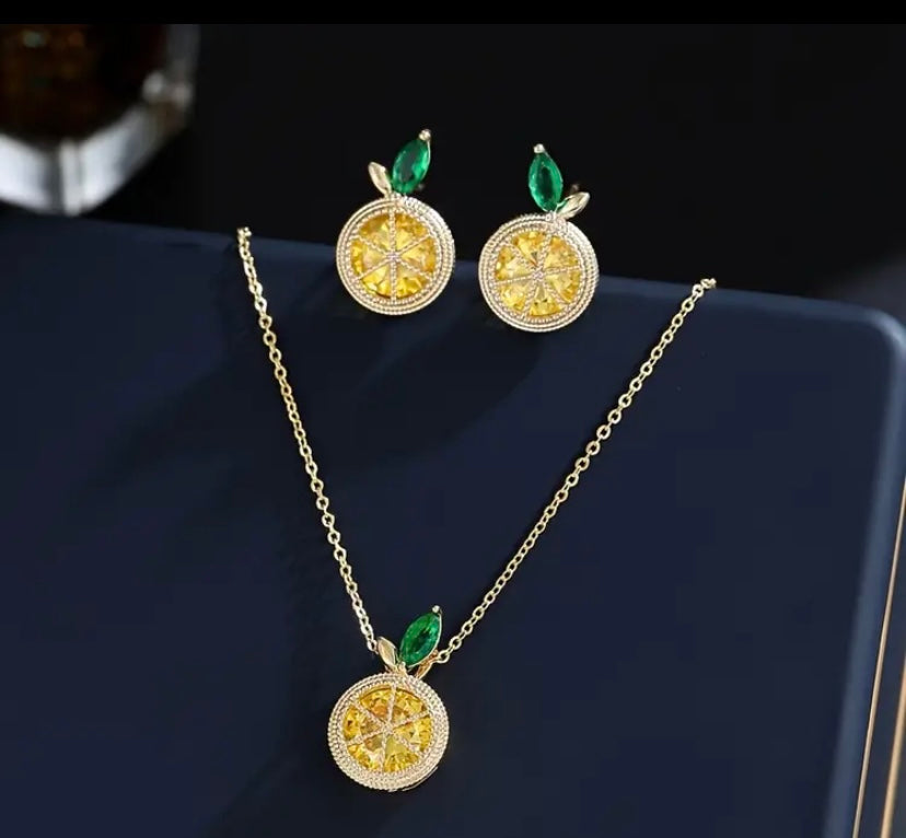 Lemon drop gold colored earrings and necklace